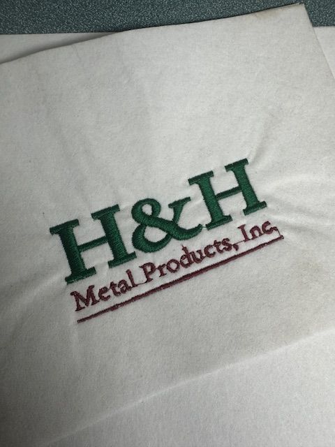 A napkin that says h & h metal products inc