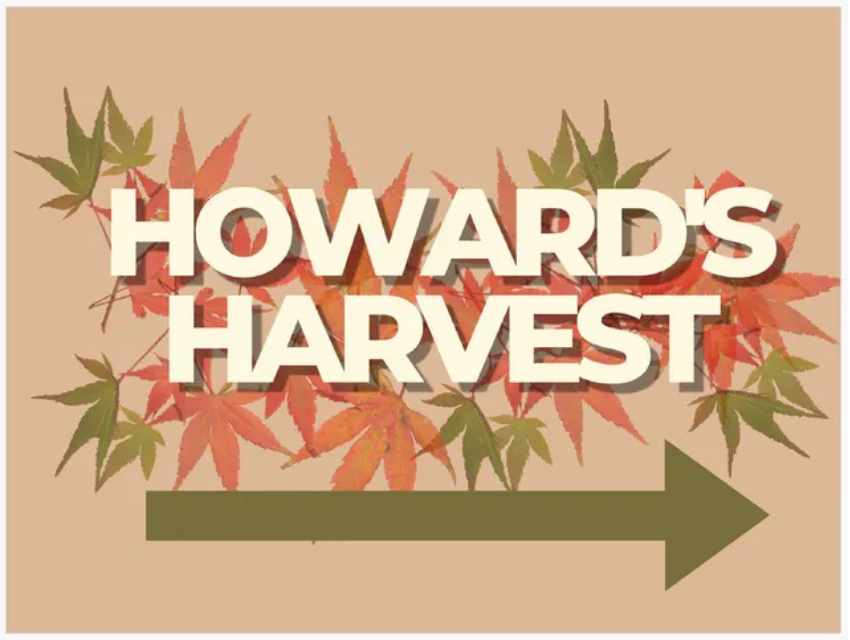 A sign that says howard 's harvest with an arrow pointing to the right