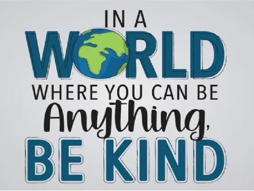 A poster that says in a world where you can be anything be kind