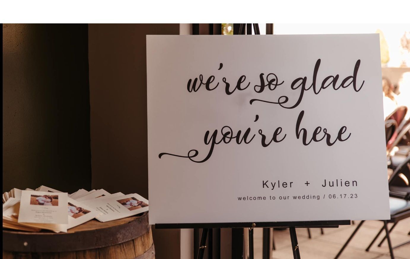 A sign that says we 're so glad you 're here