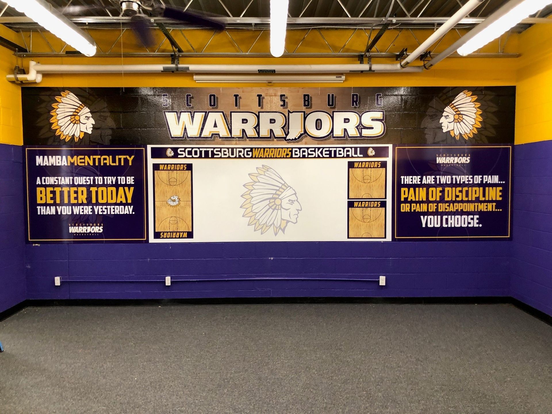 A room with a sign that says warriors on it