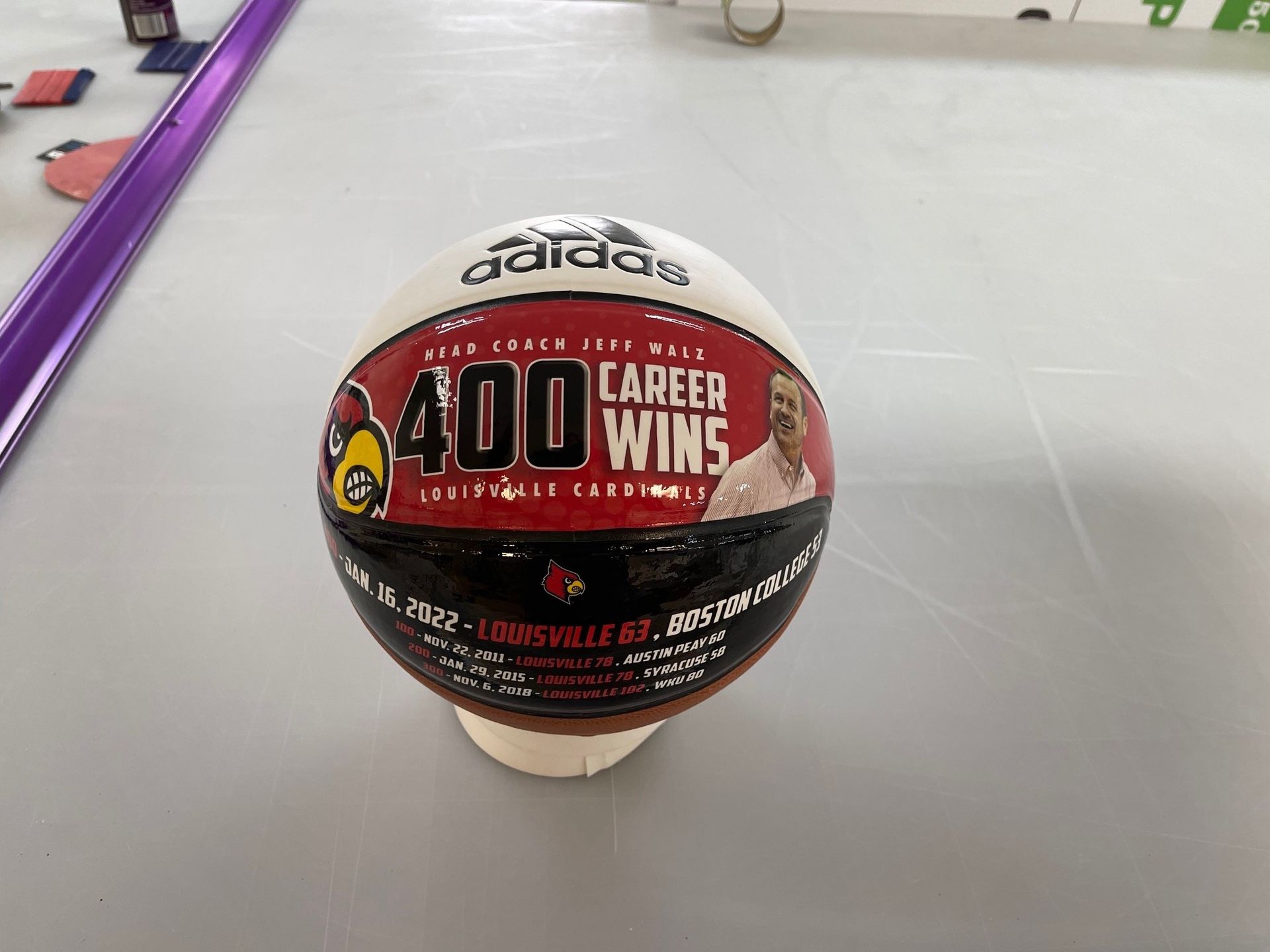 A basketball with the words 400 career wins on it