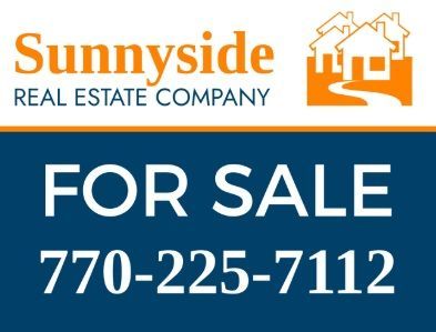 Sunnyside Real Estate Company for sale sign with phone number 770-225-7112 on a blue and white background.