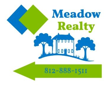 Meadow Realty sign with a house, two trees, and a green arrow pointing left, featuring the phone number 812-888-1511.