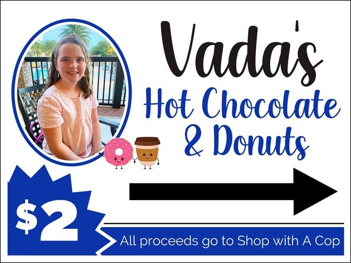 A sign that says vada 's hot chocolate and donuts