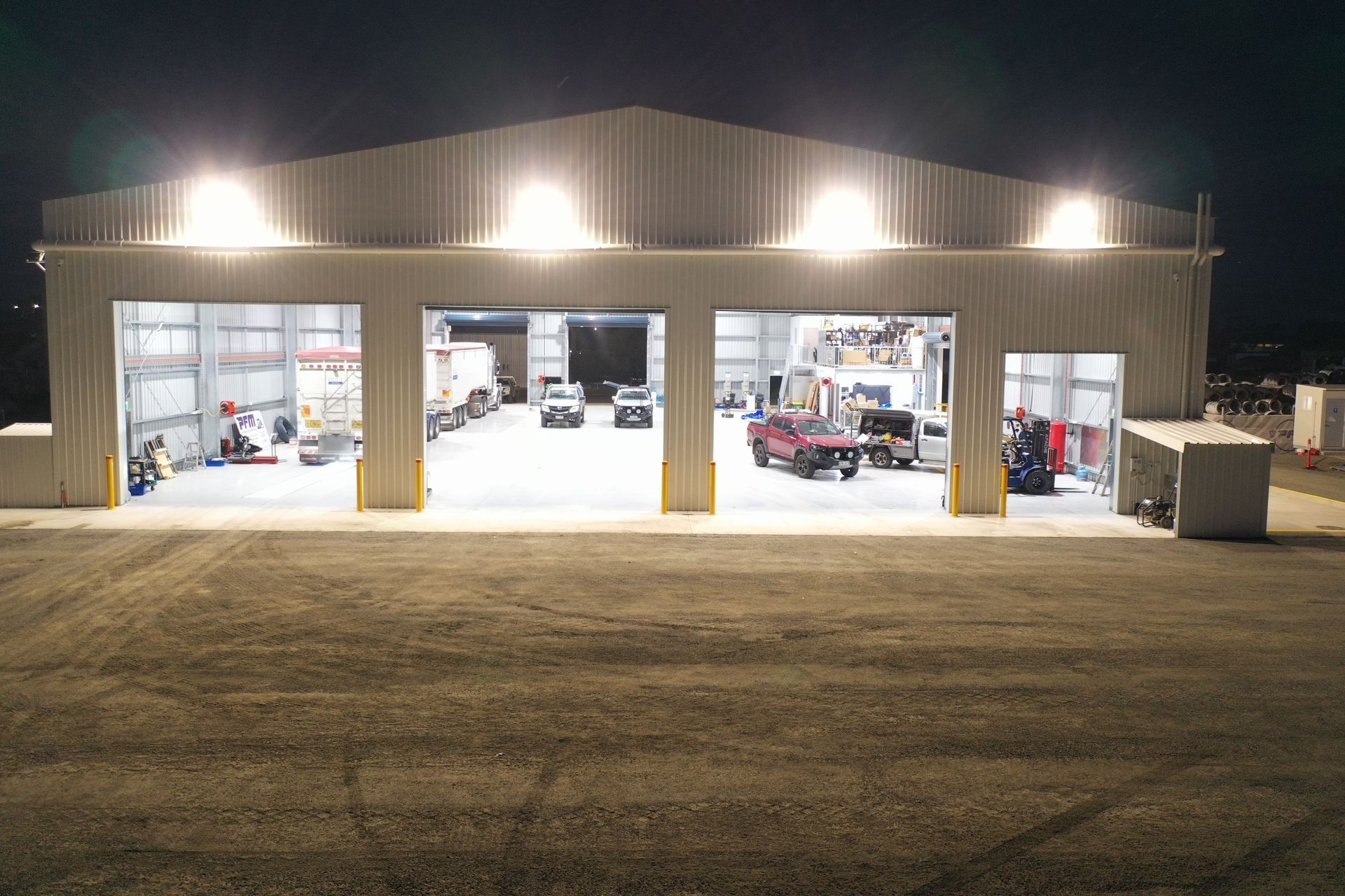 Warehouse Concrete Floor and Cars Parked Inside— CR Concreting in Pittsworth, QLD