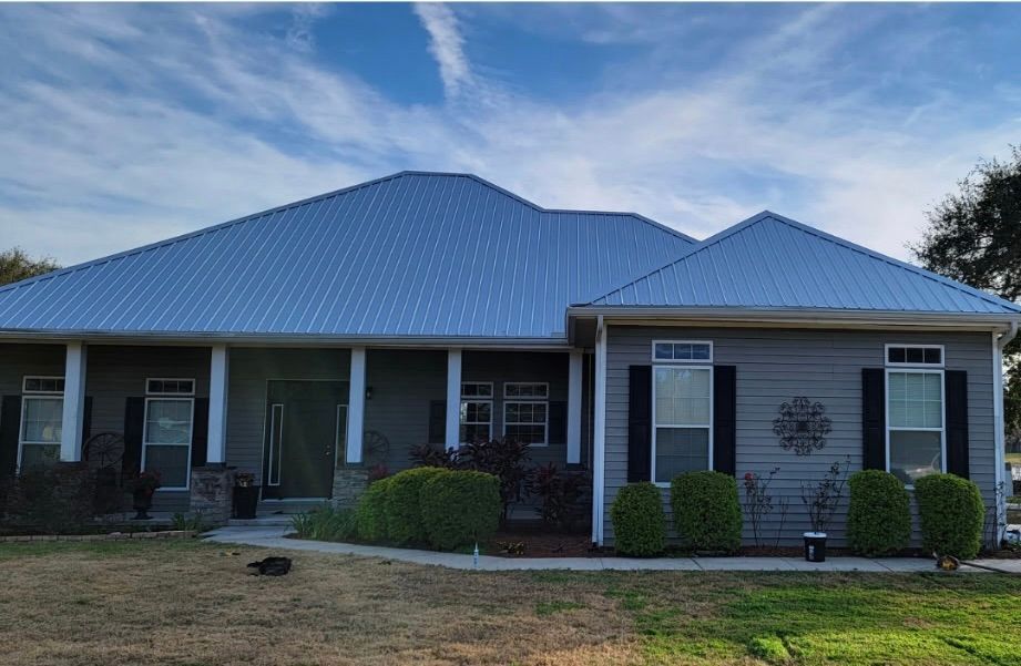 New metal roof installation on a Zephyrhills home by Triple Crown Roofing
