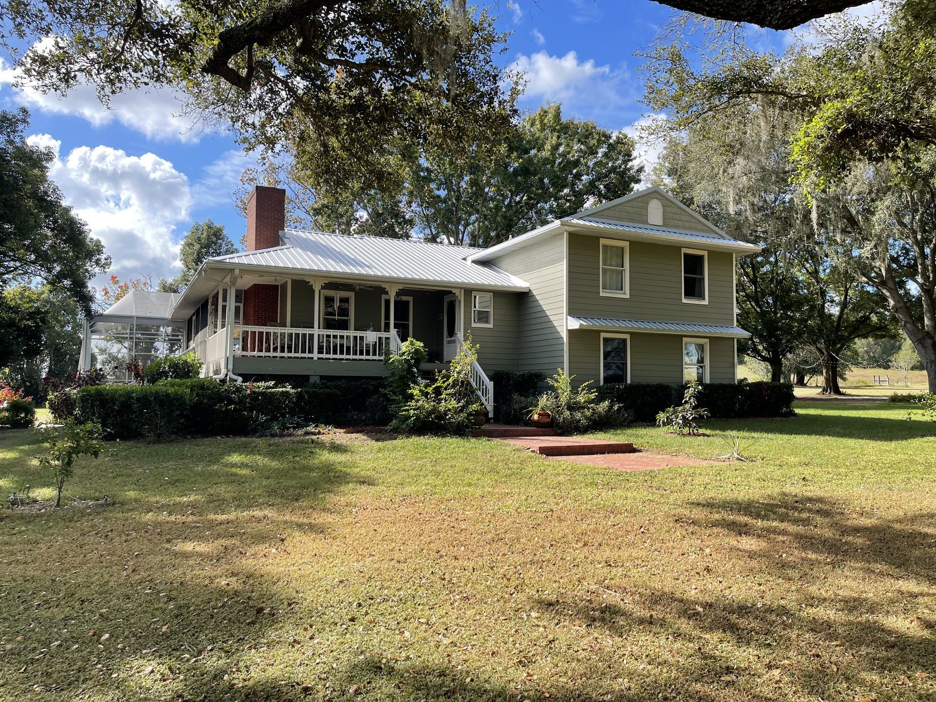 Professional roof maintenance team from Triple Crown Roofing performing roof maintenance on a residential home in Central Florida