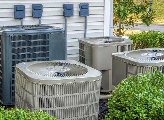 Four Air Conditioning Units Outside