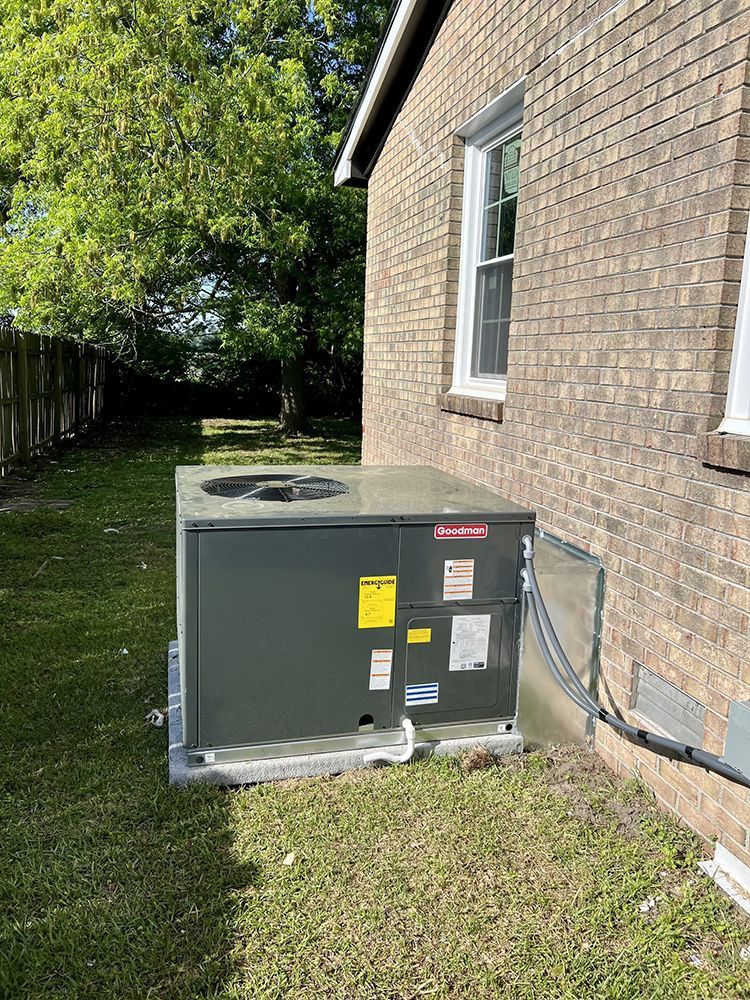  air conditioner  outside of a brick house