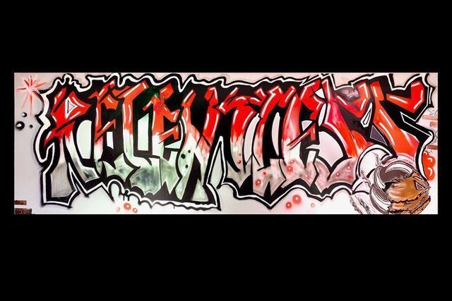 A bright mural of the word Relentless