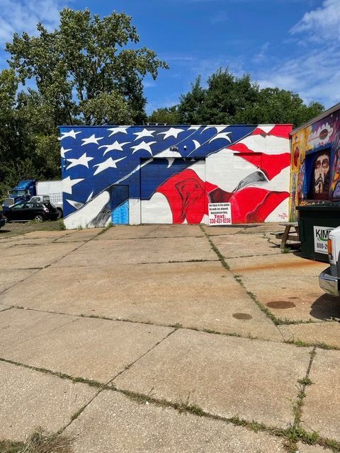 An American flag mural on a wall