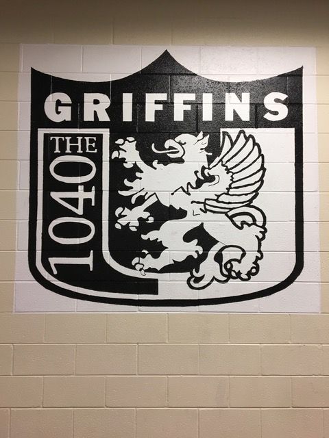 A mural on a wall of Griffons 1040