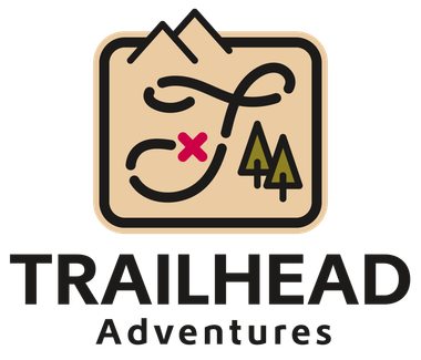 People in yellow shirts, arms linked, forming a circle, viewed from below.