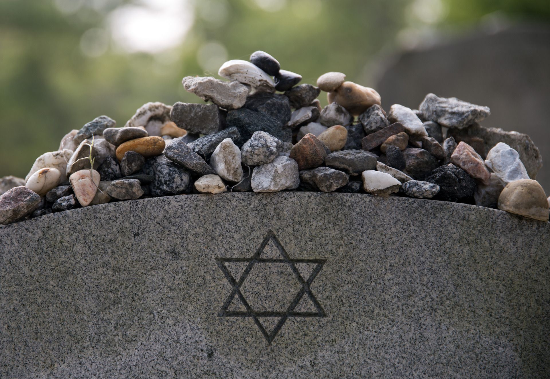 A pile of rocks with a star of david on it