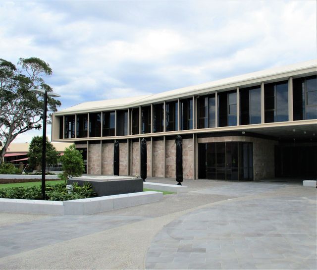 A large brick building with a lot of windows