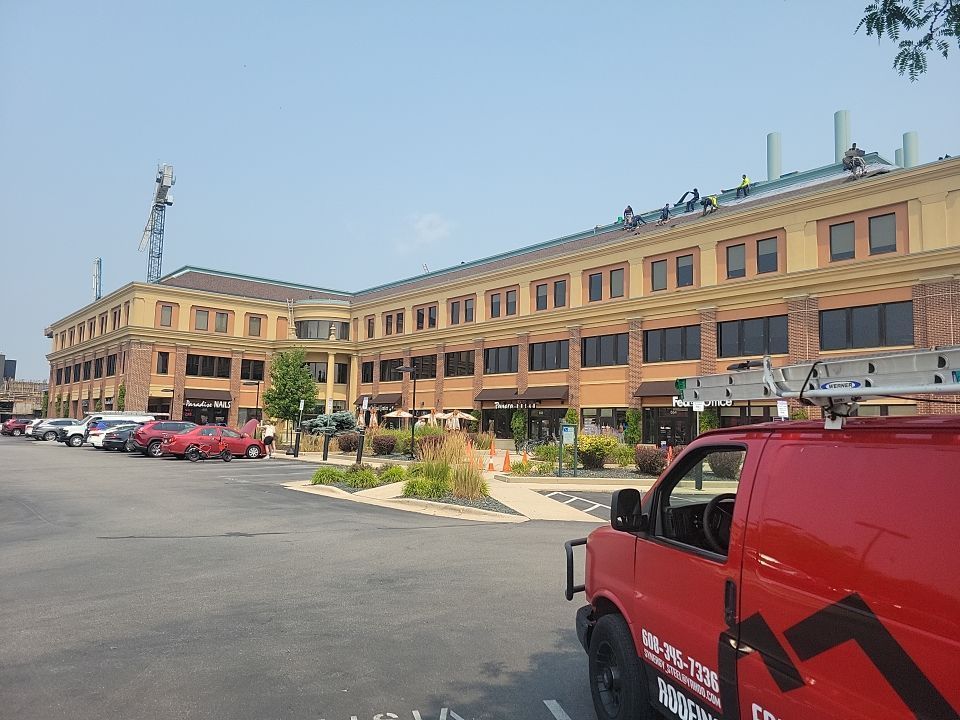A white roof with a blue sky in the background.