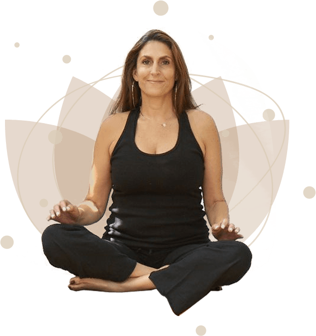 a woman is sitting in a lotus position with her legs crossed