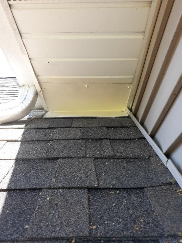 A close up of a roof with shingles on it.