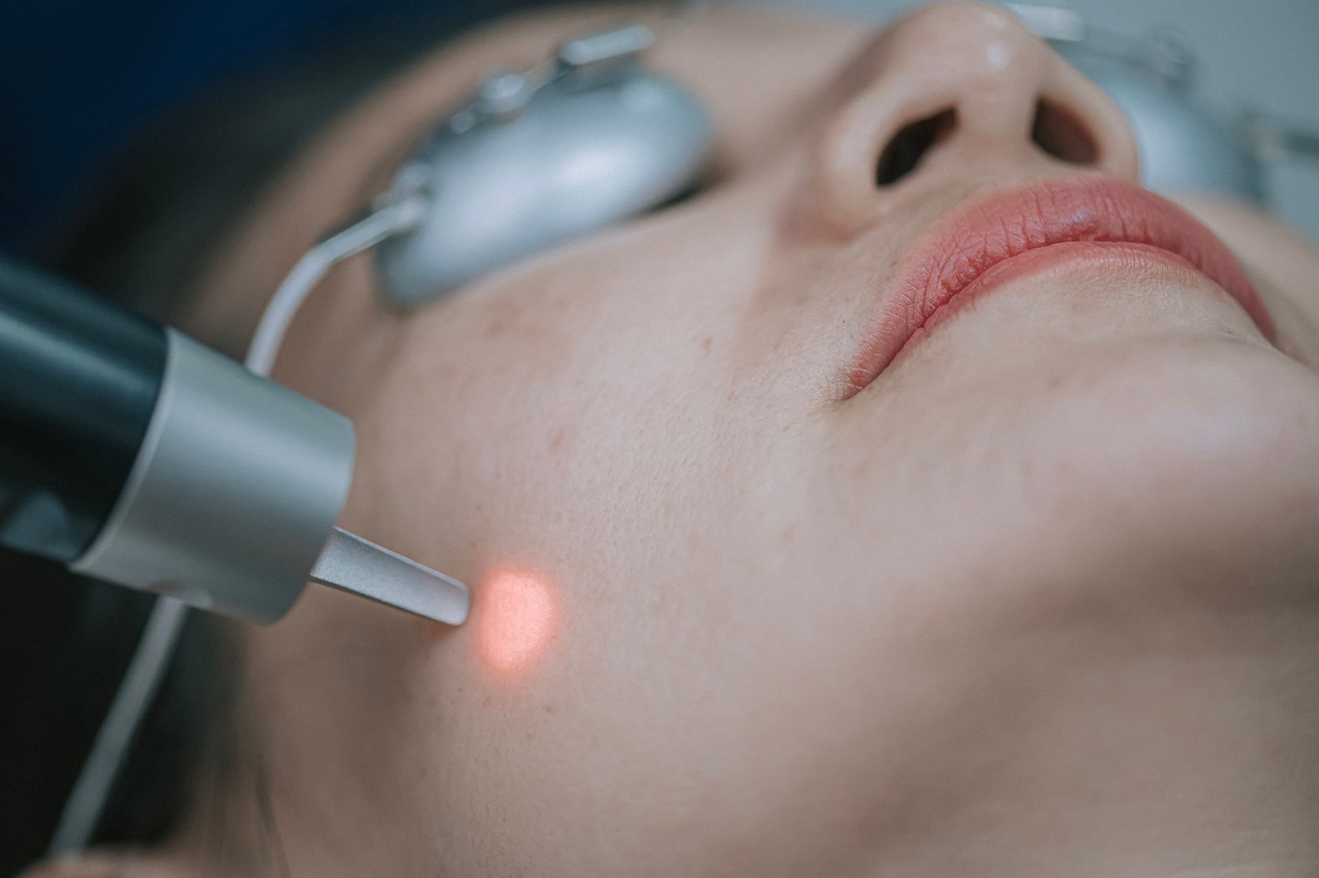 A Woman is Getting Her Legs Waxed in a Beauty Salon — Cheyenne, WY — Melt Wax Boutique