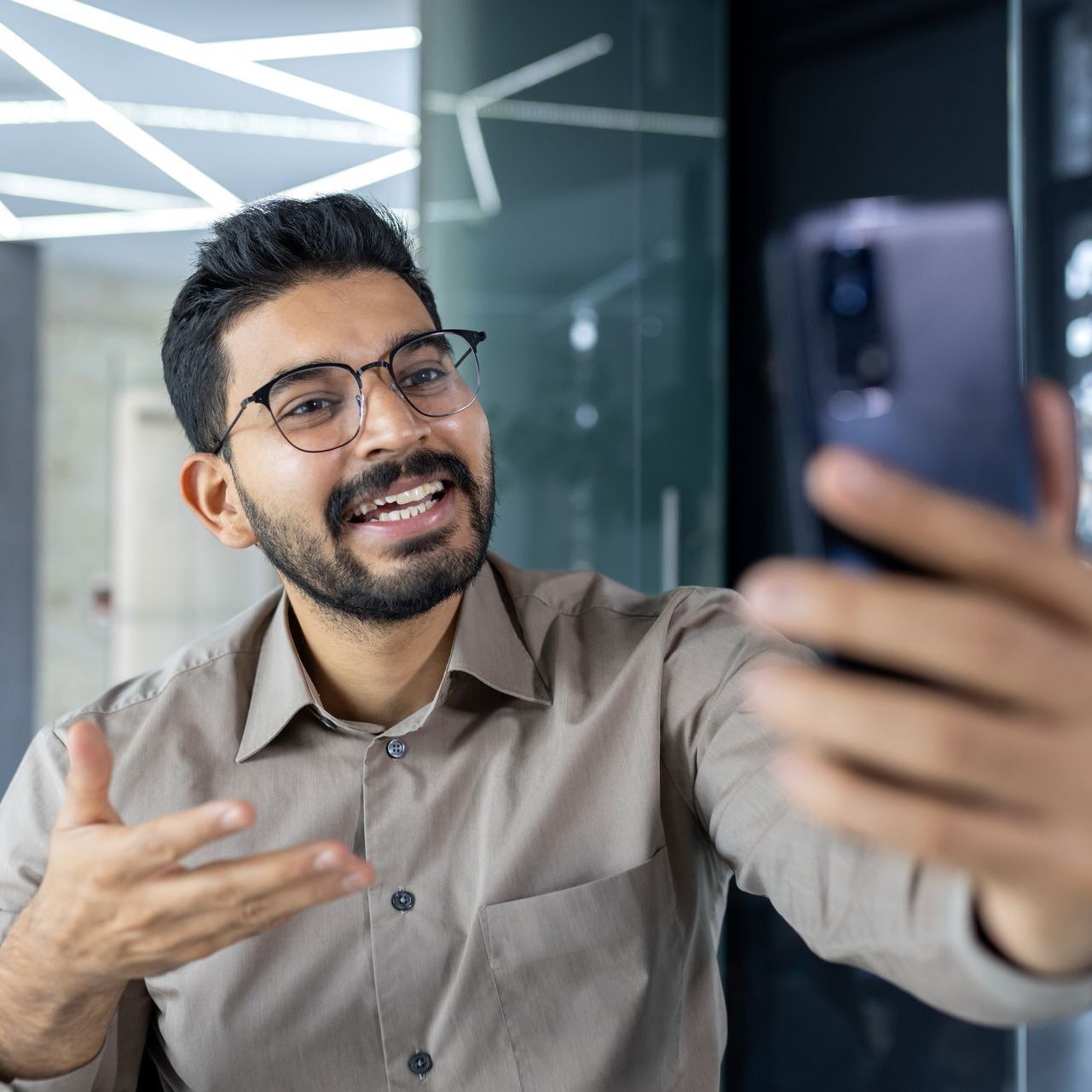 Male agent recording a video
