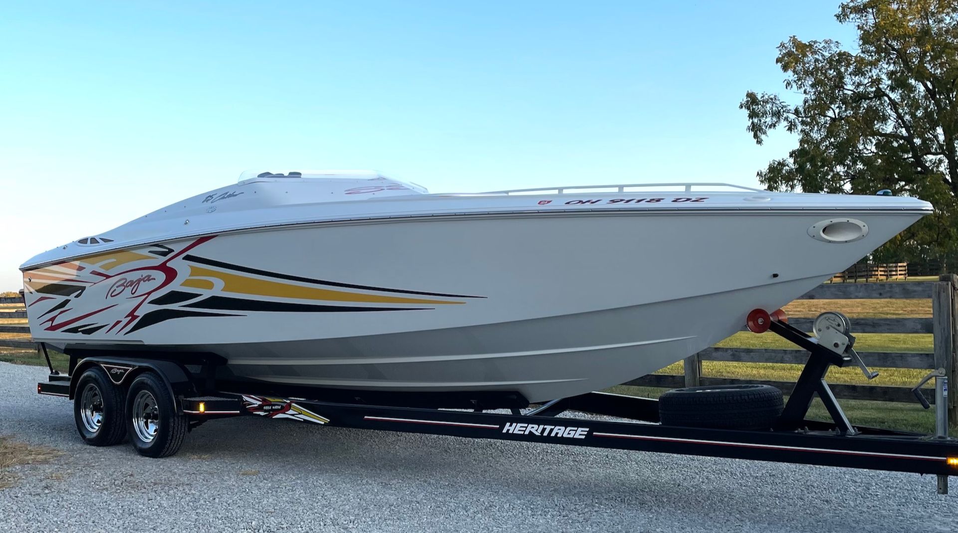 Interior view of a BMW car with brown leather seats, black steering wheel, and silver pedals.