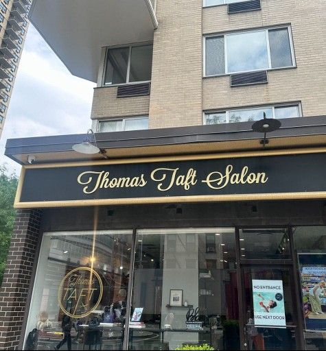 Thomas jaff salon is located in a brick building
