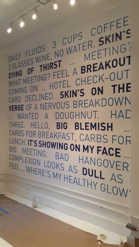 A wall with a bunch of words on it