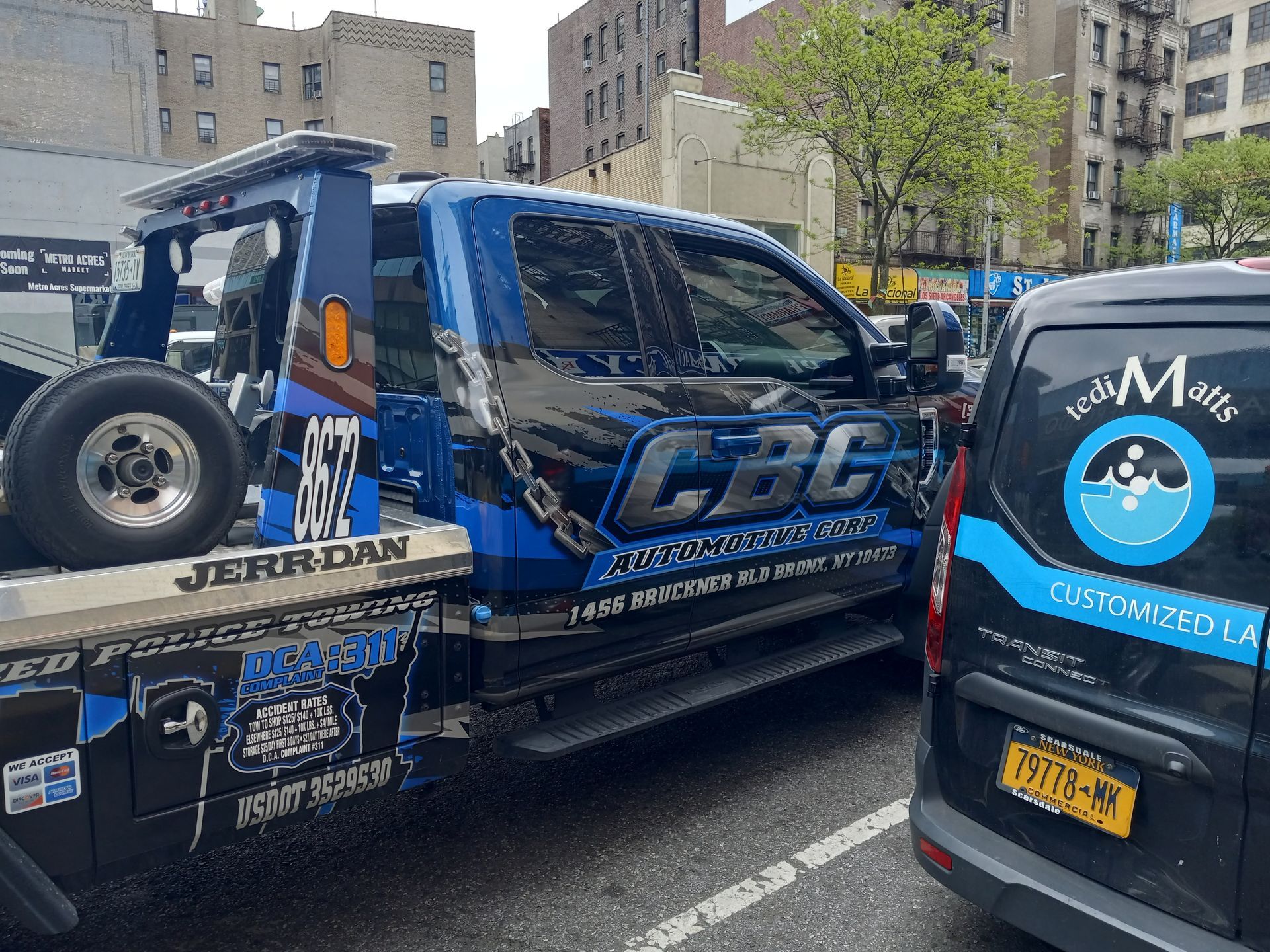 A tow truck with the word cbc on the side of it