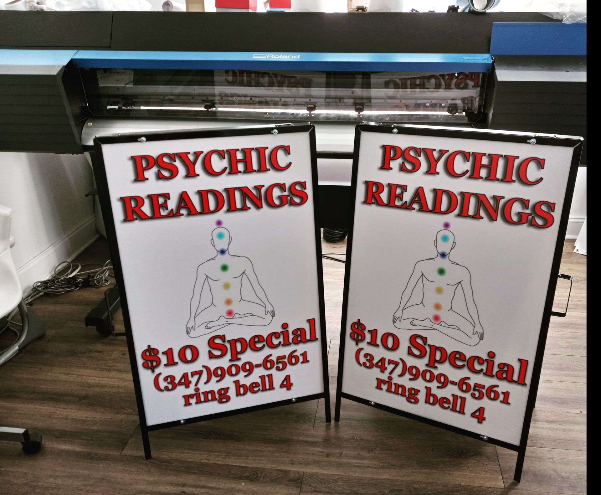 Two signs that say psychic readings on them