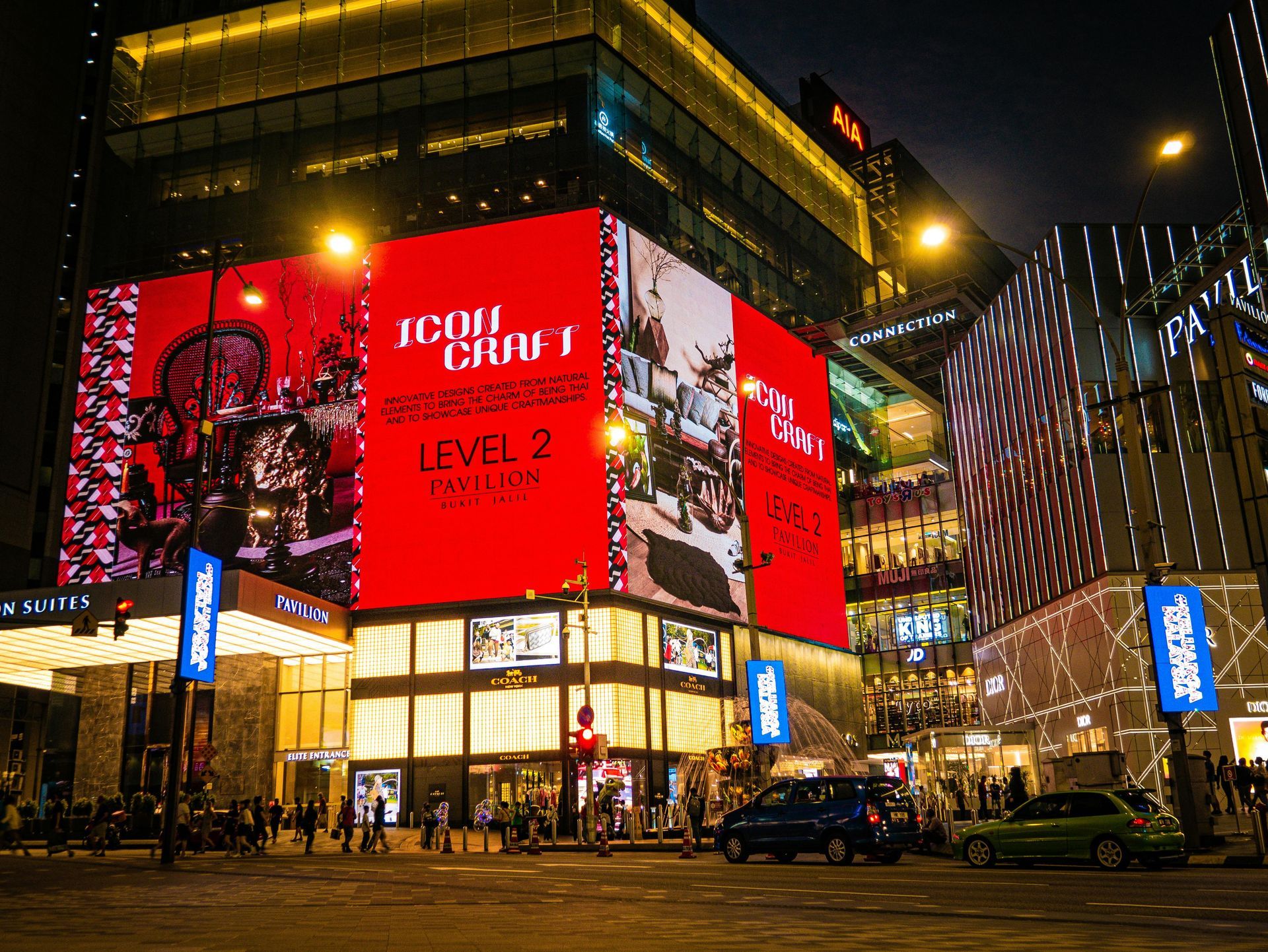 A large billboard on the side of a building says level 2