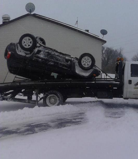 Car on snowy road — Benton Harbor, MI — Fisher Body Shop