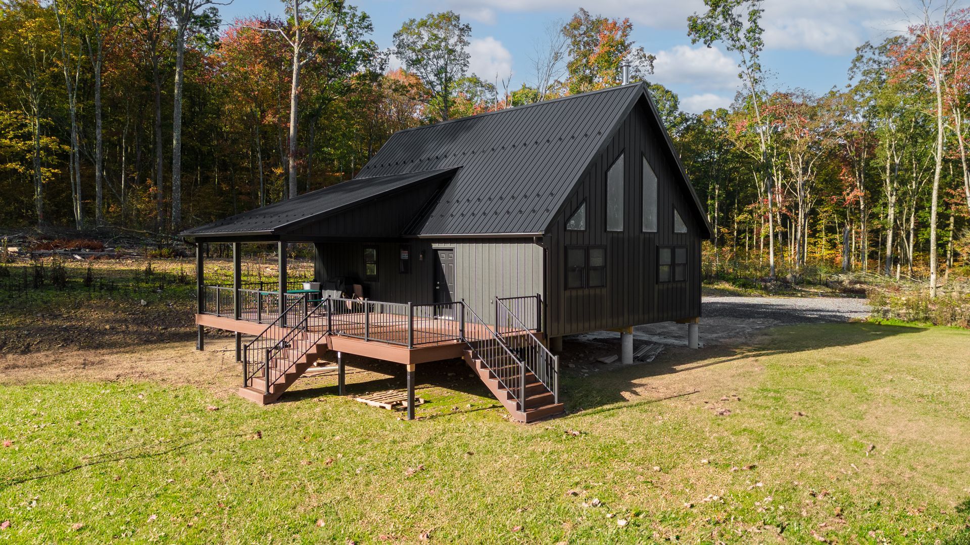 modern cabin design and construction with metal siding in Howard