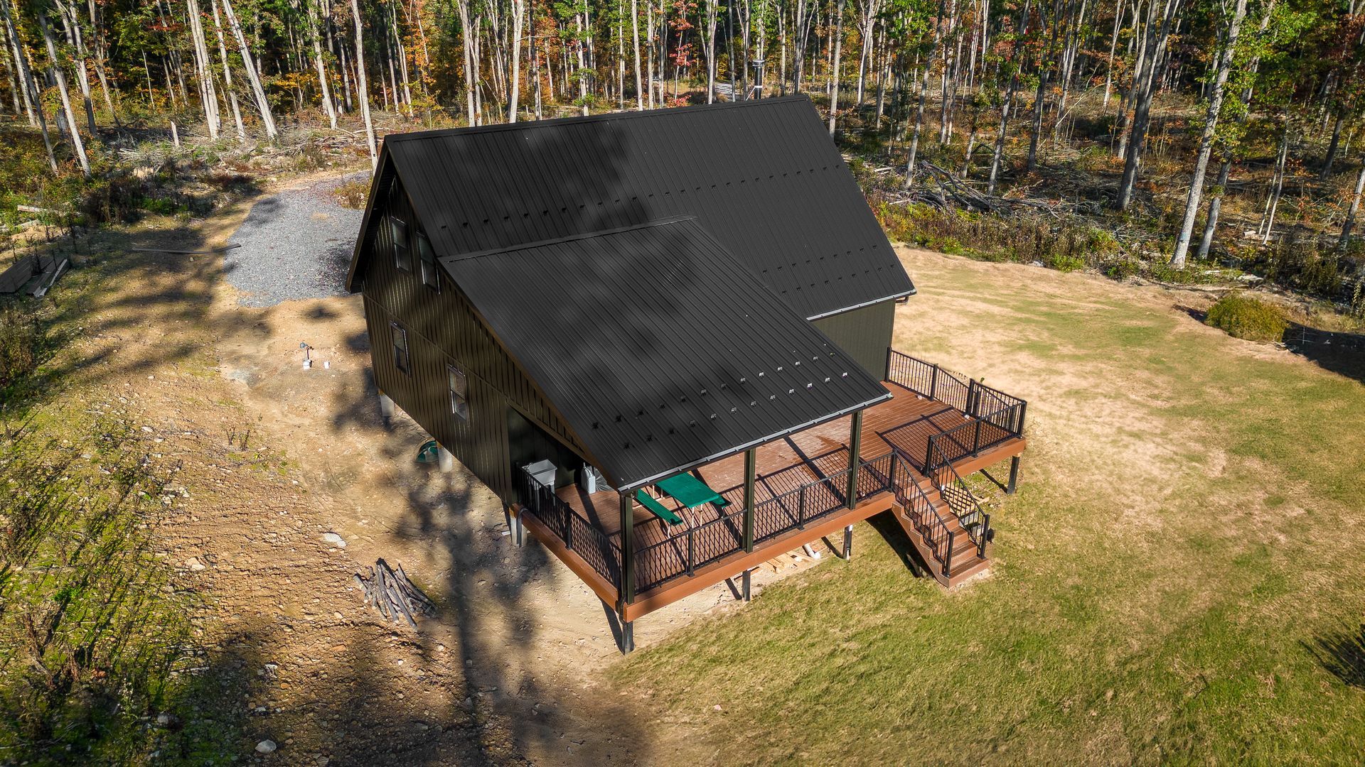 modern cabin design and construction with metal siding in Huntington