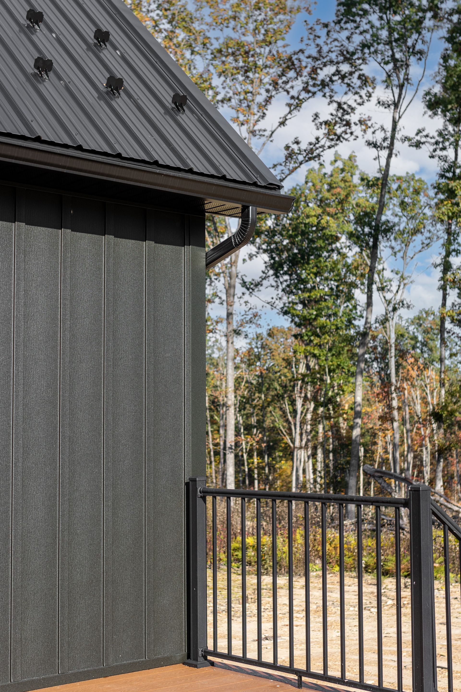 modern cabin design and construction with metal siding in  Lewisburg