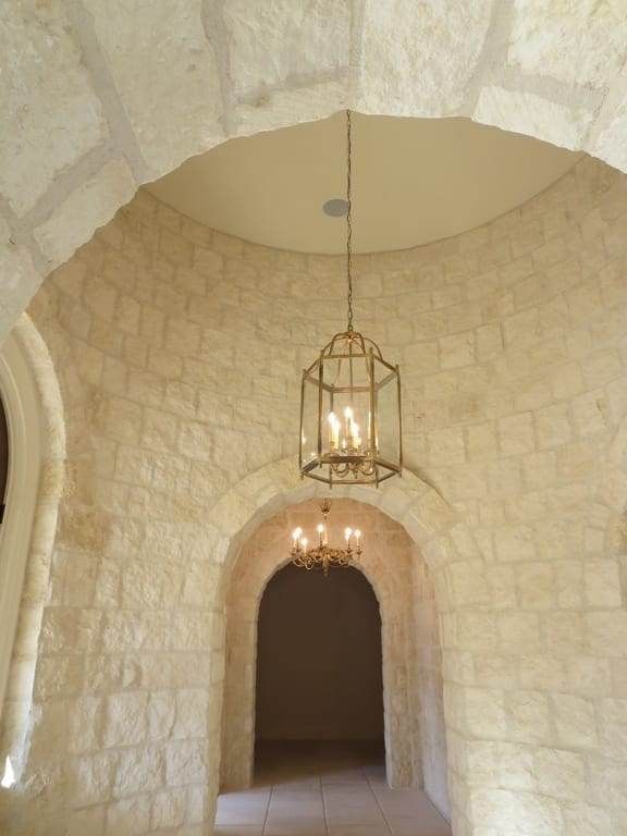 A hallway with a lantern hanging from the ceiling
