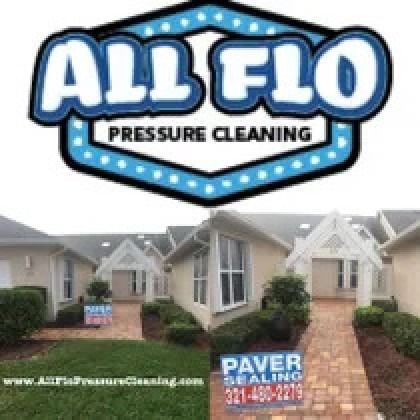 Logo for All Flo Pressure Cleaning over a photo of townhomes.