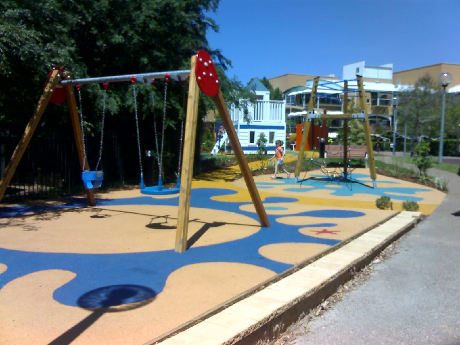 Girl Playing on Playground — Sydney, NSW — Wetpour