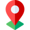 Una puntina rossa e verde con un cerchio bianco al centro.