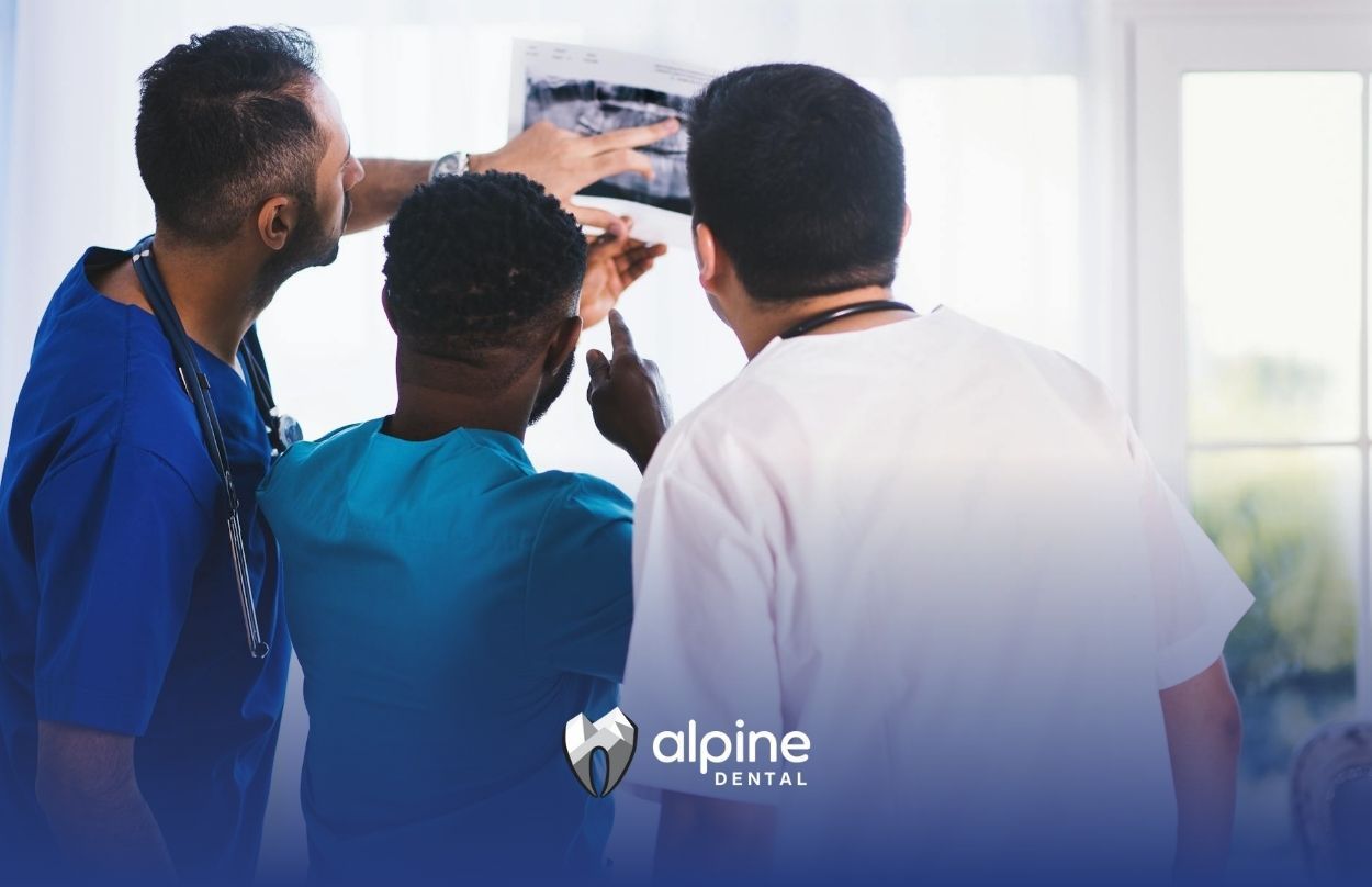 Dental team reviewing patient X-ray together in Lakewood, NJ, confirming if it show diabetes signs.