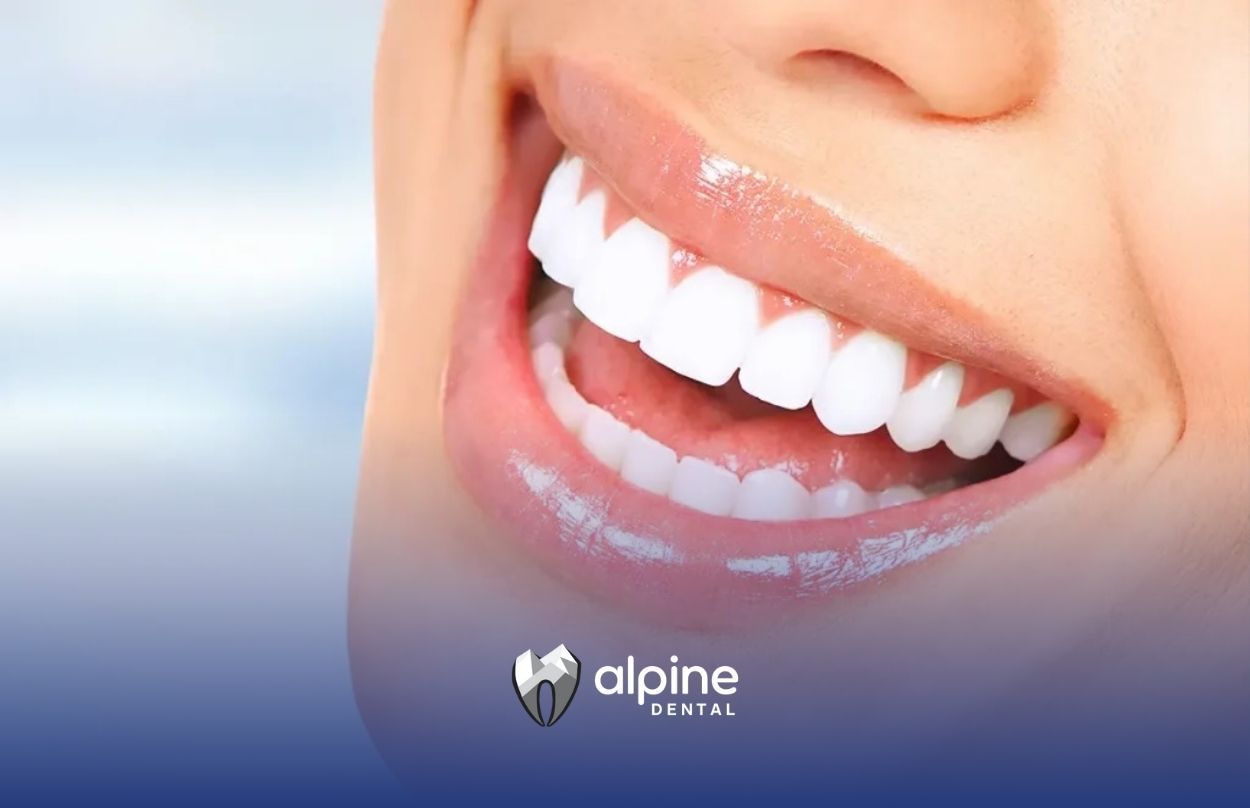 A person showing off their pearly white dental veneers in a joyful smile at a clinic in Lakewood NJ.