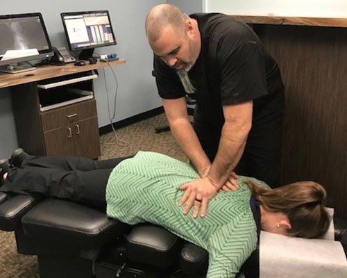 Back Adjustment — Doctor manually manipulating joints in Gastonia, NC