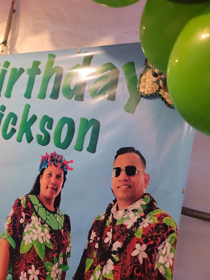Banner with photos of a smiling man in sunglasses and a woman, plus green balloons. 