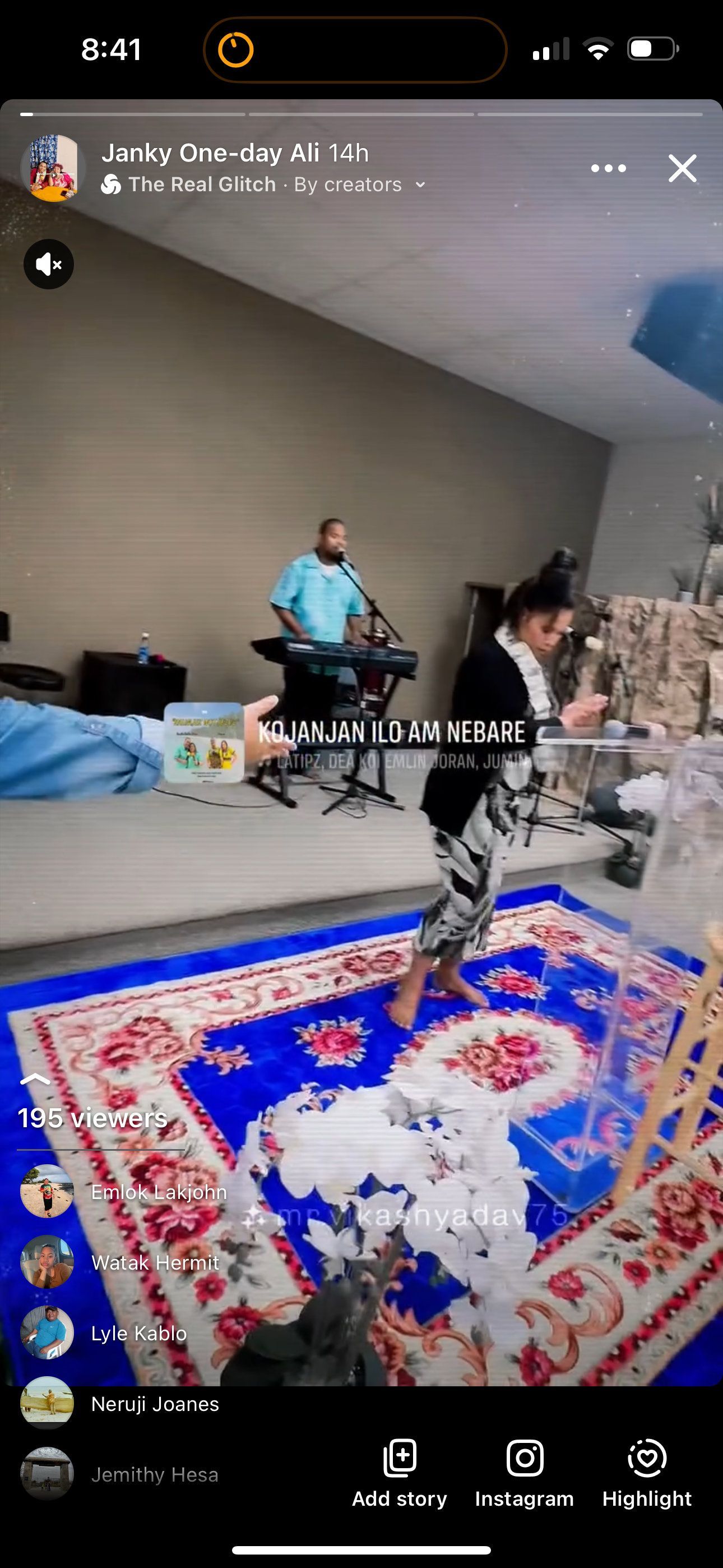 A woman dancing on a rug, a man playing a keyboard, and a room with a blue ceiling.