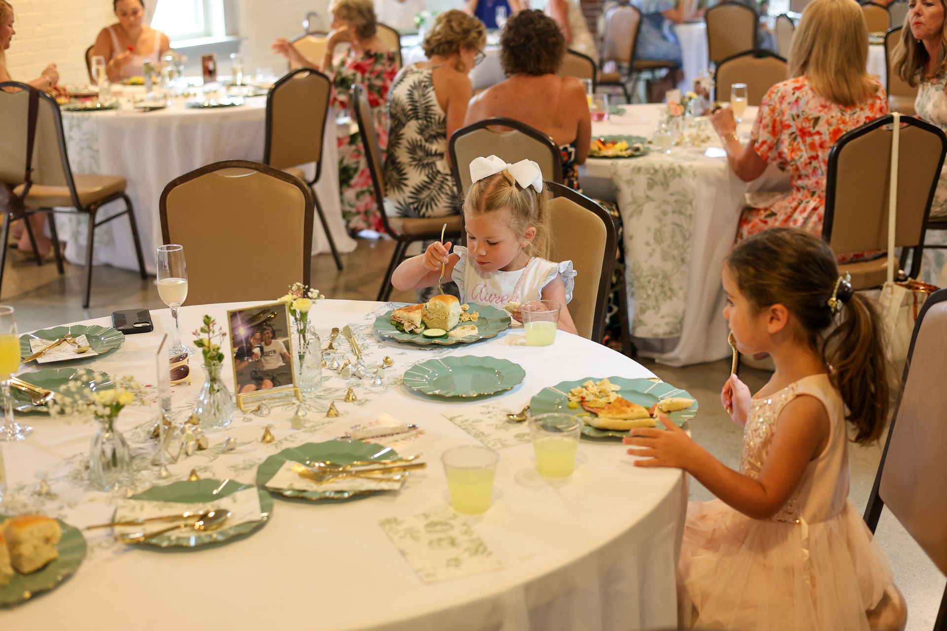 Reception table with flower girls
