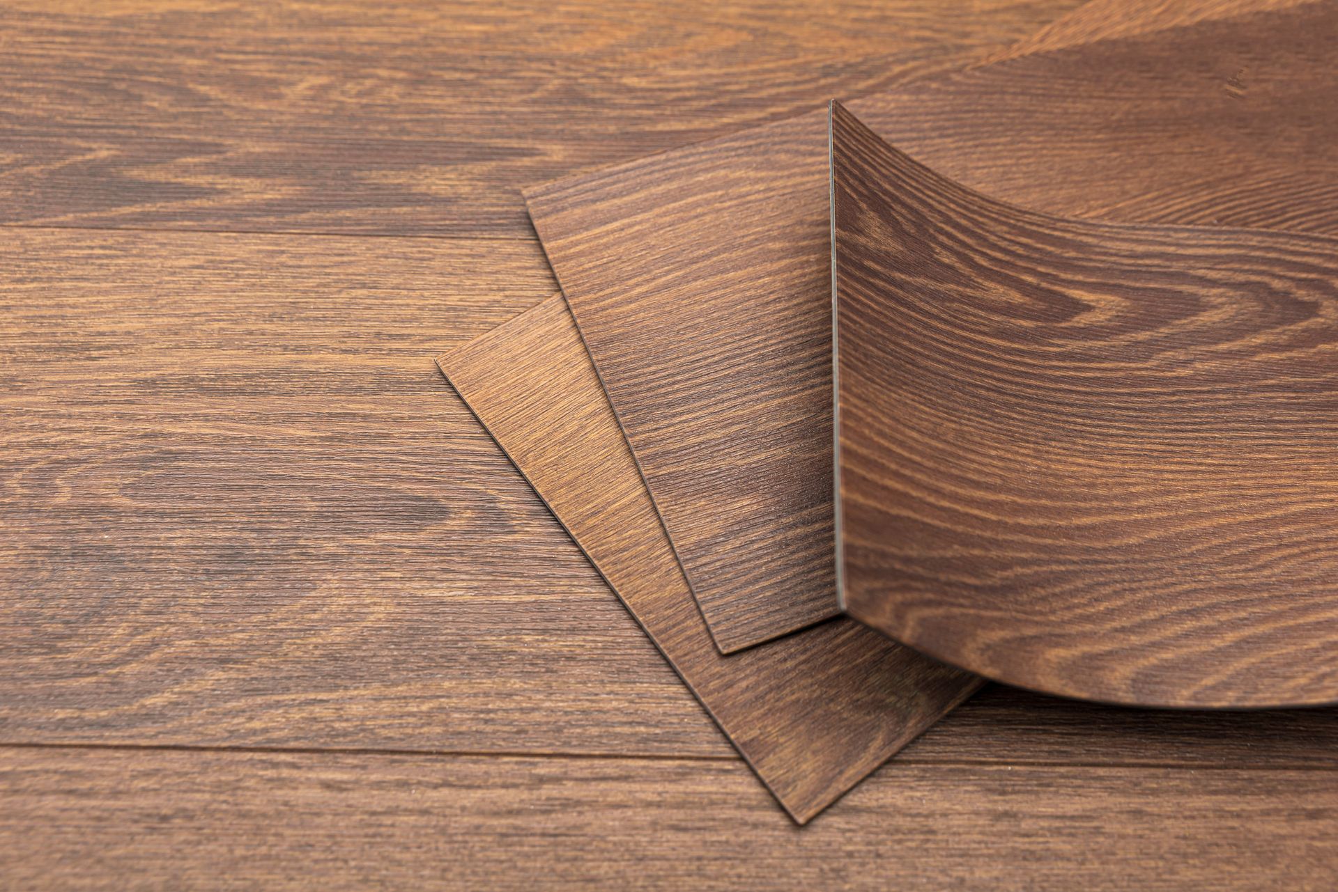 Wooden planks with various textures and hues.