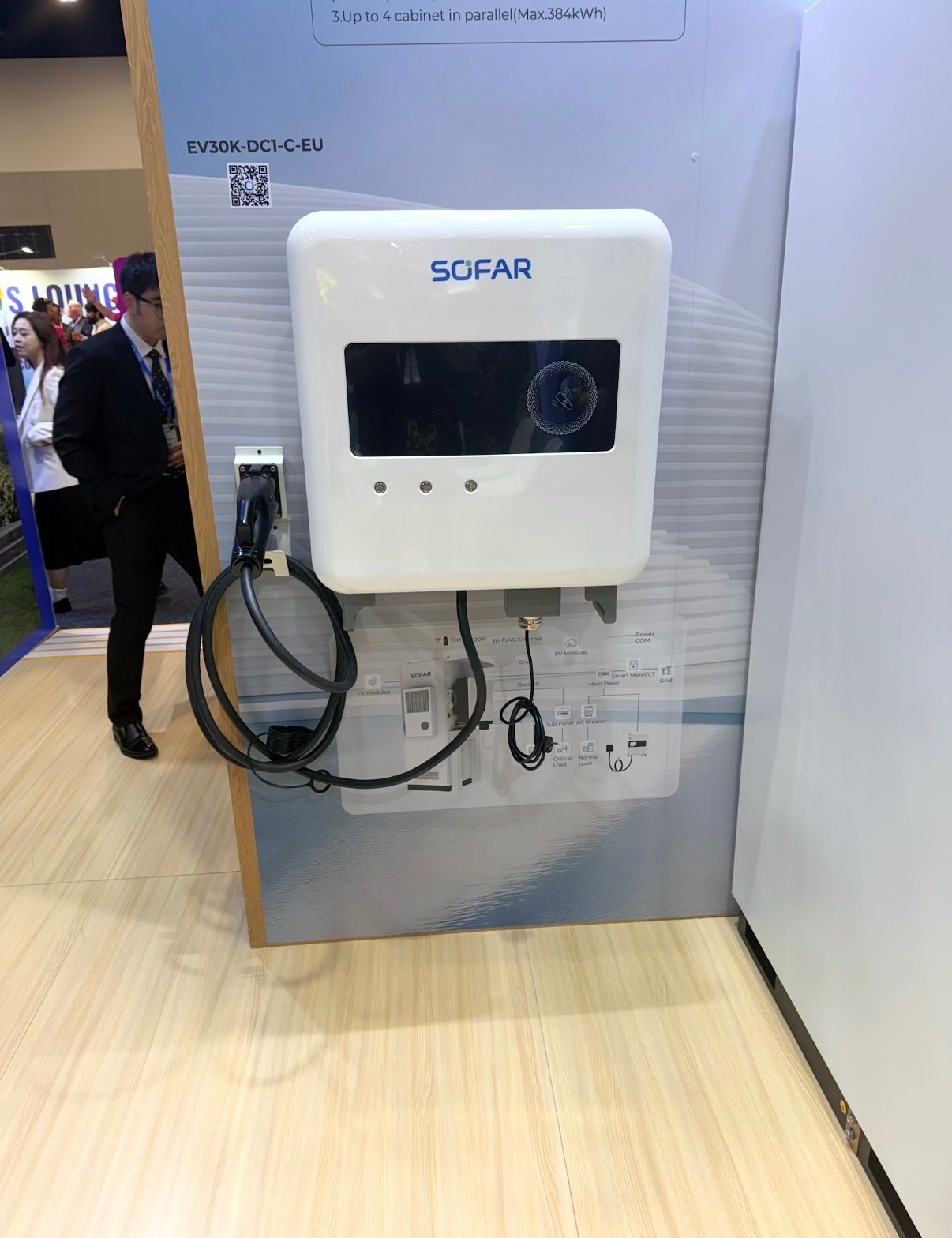 A Grey Solar Inverter Mounted on a Brick Wall — Macleay Energy Solutions In Kempsey, NSW
