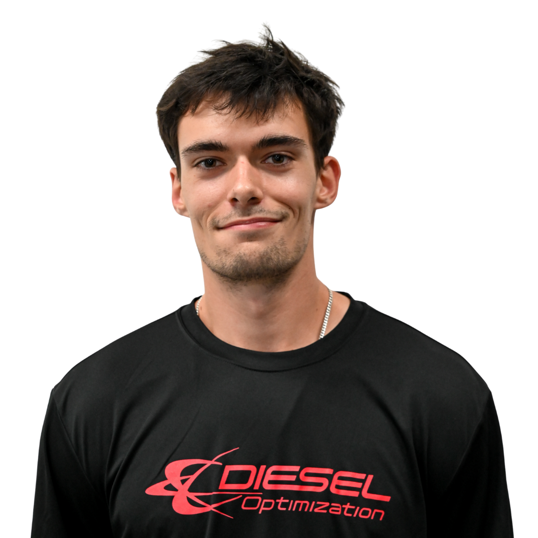 Smiling man with a beard, wearing a dark 