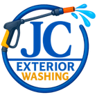 Blue and orange logo for JC Exterior Washing. Pressure washer spraying water, blue circle frame.
