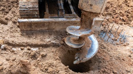A Bulldozer is Drilling a Hole in the Ground — Tomac Civil In Burleigh Heads, QLD
